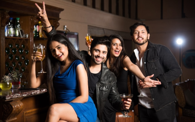 group-indian-asian-friends-sitting-lounge-bar-having-drinks-cocktails-celebrating-new-year-birthday-success_466689-13681